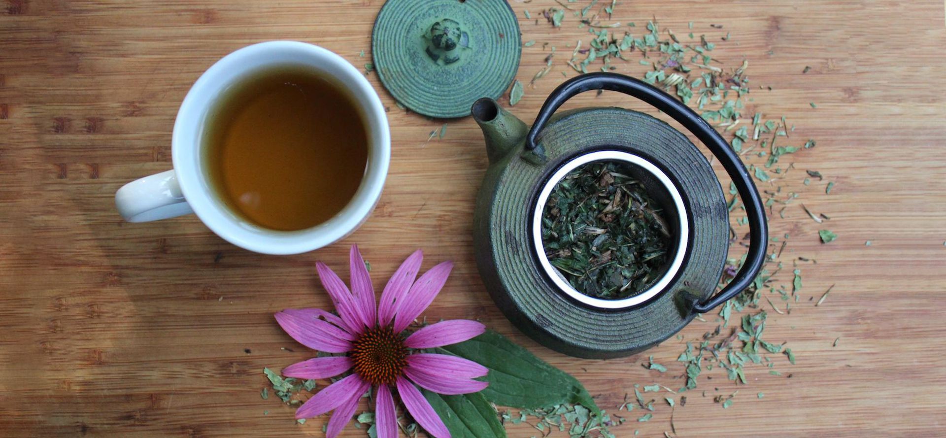 Cup And Kettle Of Echinacea Tea.