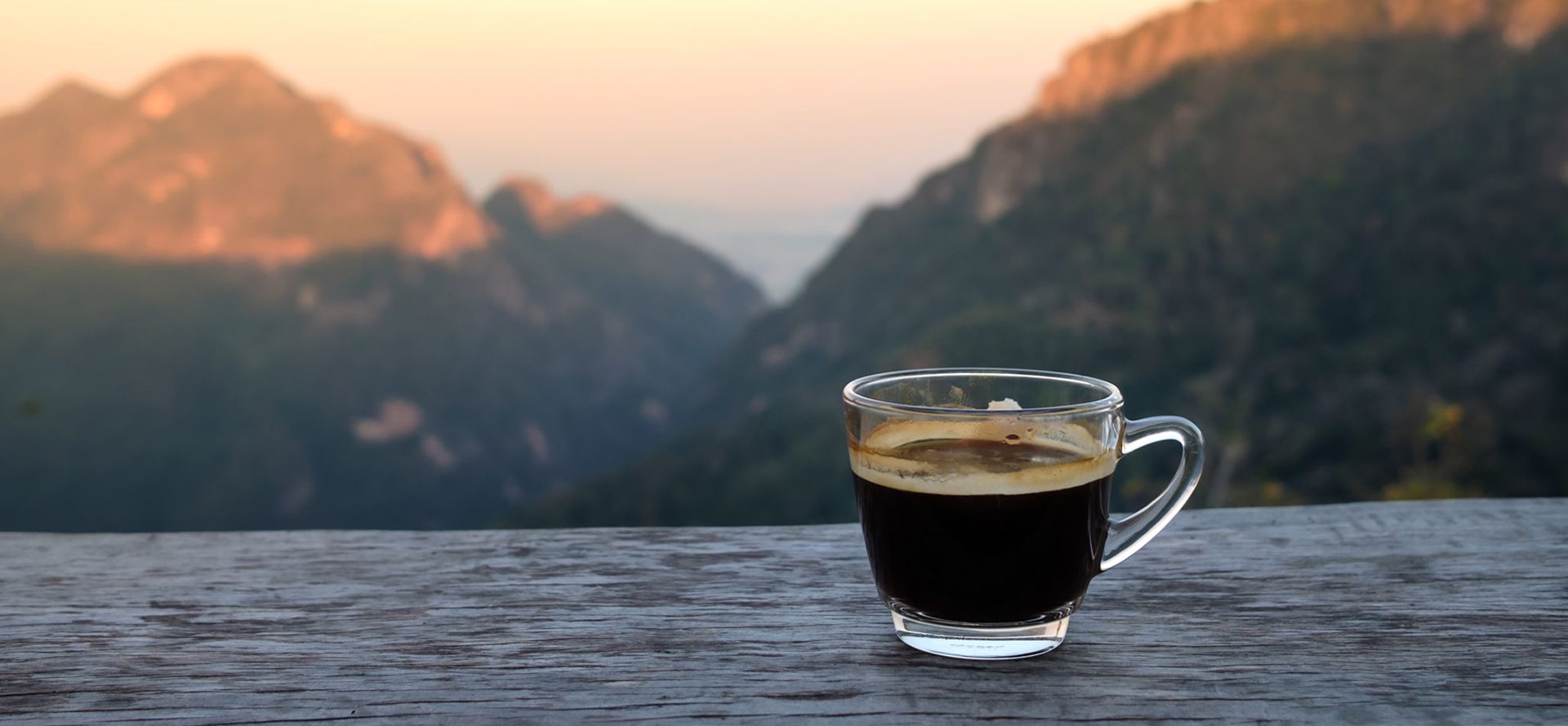 Americano on the background of the mountains.