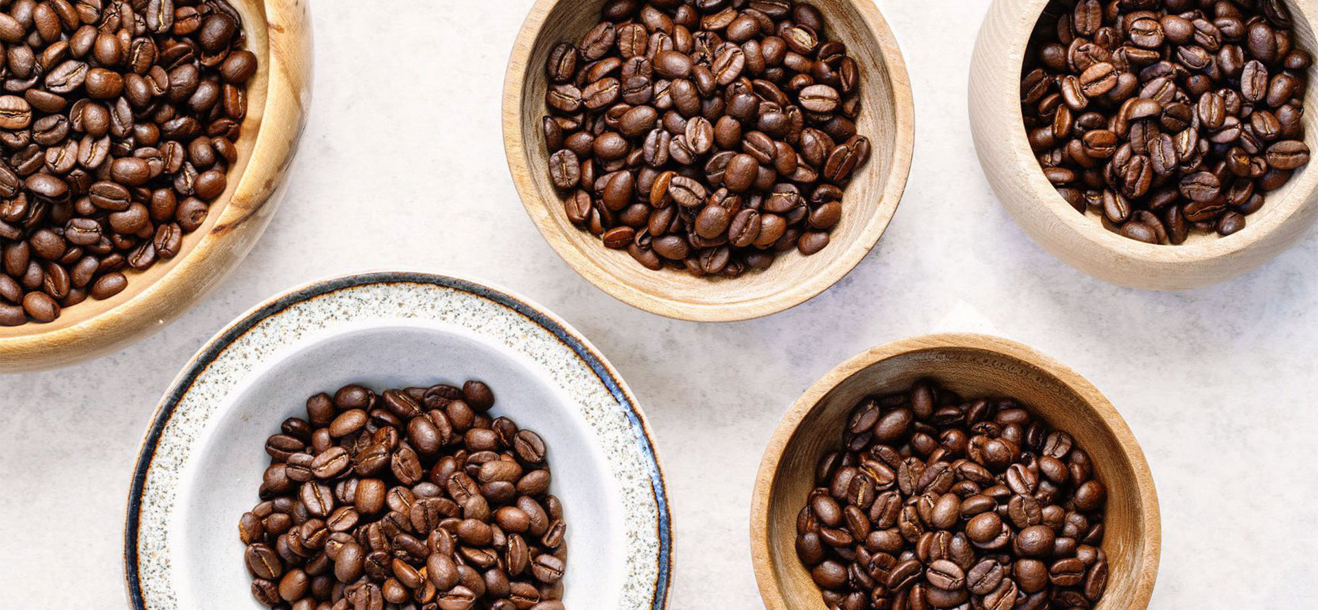 Arabica Coffee Beans In Plates.
