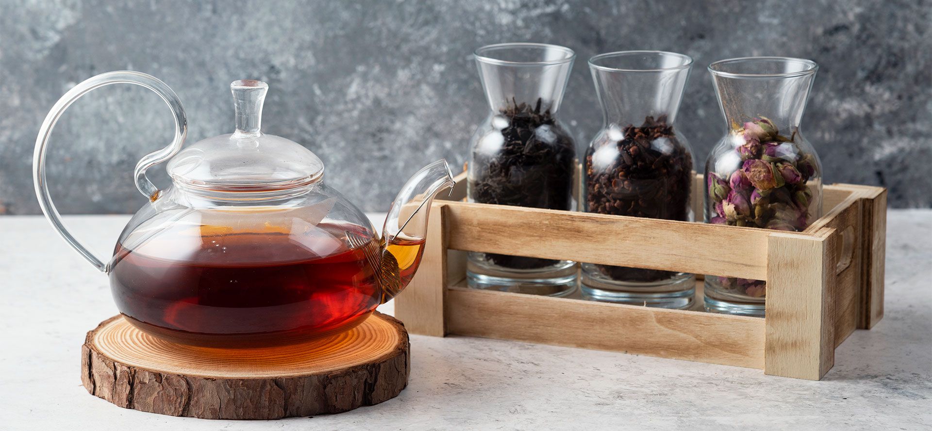 Brewed Black Tea In The Glass Teapot.